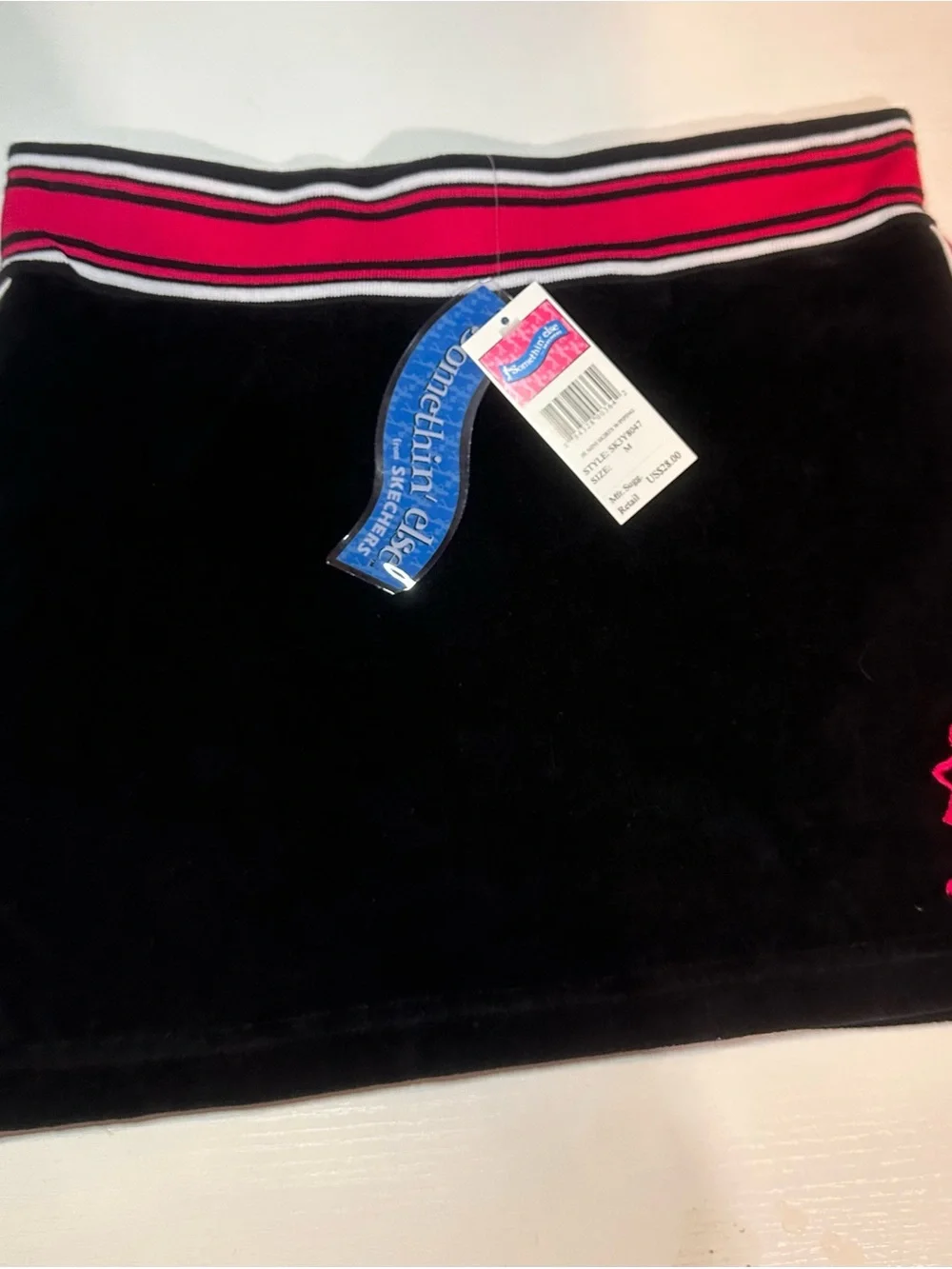 Skechers Black Velour Mini Skirt with Pink Trim. Juniors size medium